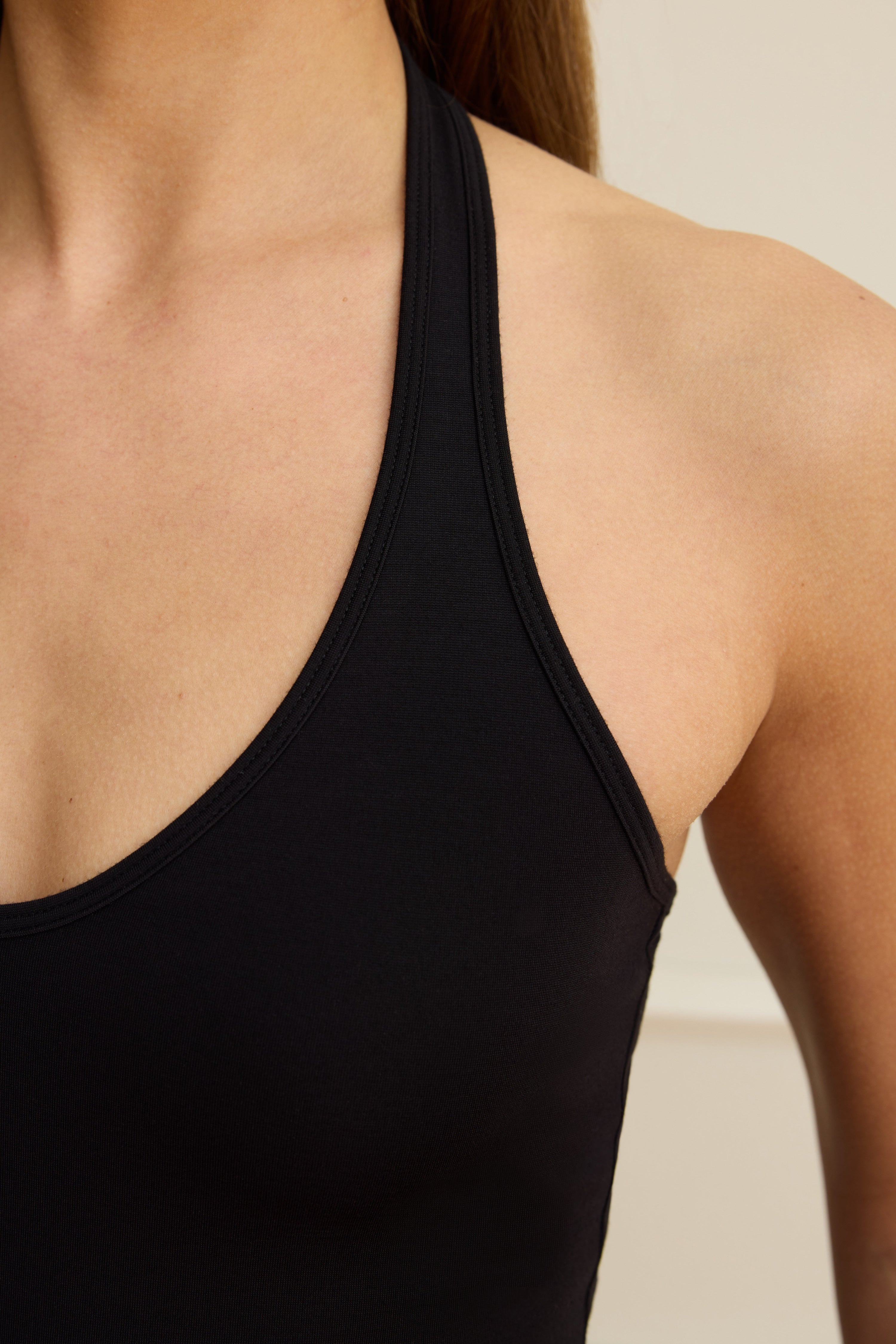 Black sculpted halterneck top